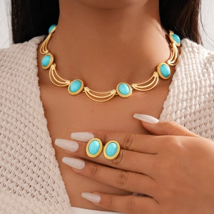 Parure collier et boucles d'oreilles dorée vintage avec pierres turquoise ovales