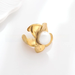 Detailed close-up of 18k gold plated flower ring with a large white center pearl