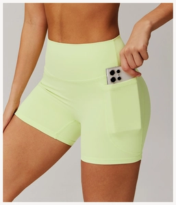 High-waisted neon green yoga shorts with functional side pocket for phone storage