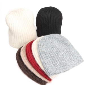 Detailed view of ribbed wool blend beanies in six various colors with soft plush texture