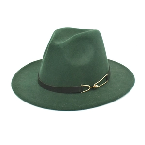 Close-up of emerald wool fedora featuring a black leather band and gold metal buckle