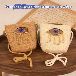 Kids cute woven straw crossbody bag with evil eye crystal charm and tassel in two colors