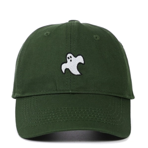 Close-up of white ghost embroidery on dark green cotton twill baseball cap fabric