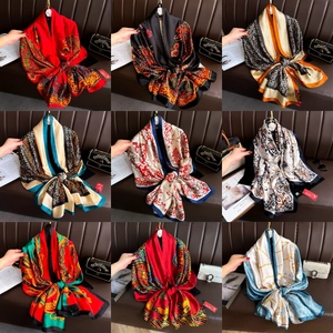 Collage of long silk scarves featuring paisley and floral patterns in nine vibrant colors