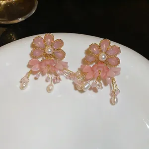Pink floral drop earrings with freshwater pearls and tassels in a romantic style