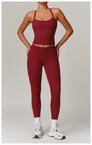 Front view of a dark red high-waisted yoga set with sports bra and matching leggings