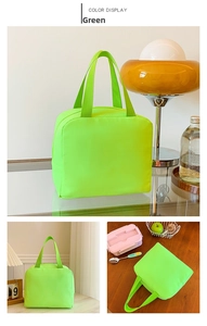 Detail of green thermal insulated lunch bag with durable handles and zip closure