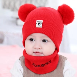 Red knit baby winter hat with double fur pom poms and matching scarf set for infants