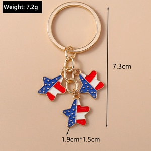 Close-up of golden star keychain featuring American flag pattern with size specifications