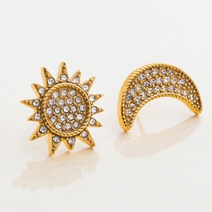 Close-up of 18K gold stainless steel earrings featuring sun and crescent moon designs with diamonds