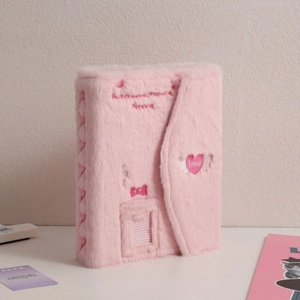 Detail of A5 plush photocard binder with love embroidery and soft pink faux fur texture