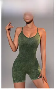 Detail of sage green ribbed yoga bodysuit with slimming waist texture and thin straps