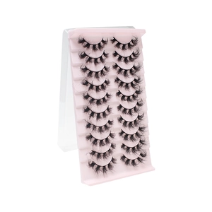 Dramatic and dense 10-pair false eyelashes set with natural curl on pink tray