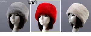 Detailed views of winter faux fur hats in light gray, red, and off-white colors