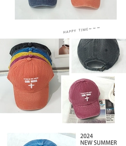 Detail showing various colors of washed cotton baseball caps with God Wins embroidery