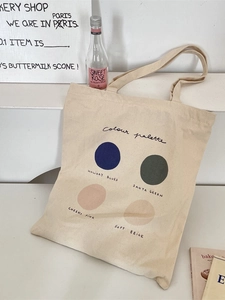 Minimalist cream canvas tote bag with artistic color palette print for students