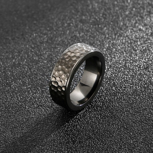 Industrial style black titanium steel ring with hammered texture for men