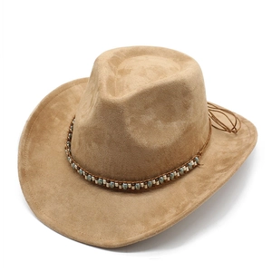 Detail of khaki suede western cowboy hat featuring colorful beaded ethnic style band