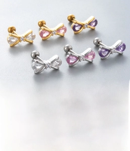 Detail view of titanium steel bow earrings with zircon inlays and sizing specifications