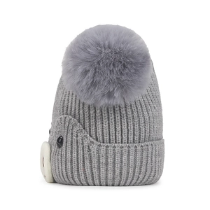 Cute grey baby knit hat with fluffy pompom and decorative animal face for winter warmth