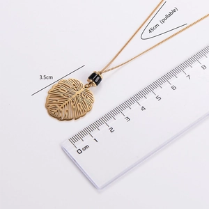 Gold stainless steel monstera leaf pendant necklace with adjustable pull chain and size guide