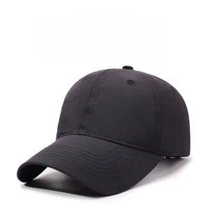 Detailed close-up of a black baseball cap featuring reinforced stitching on the brim