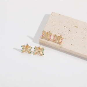 Boucles d'oreilles papillon vintage français en émail rose et bleu avec dorure
