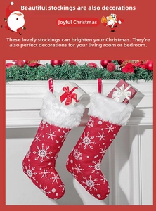 Detailed view of red Christmas stockings with white snowflake embroidery and plush trim
