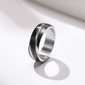 Minimalist black and silver stainless steel ring for men with diagonal grooved texture