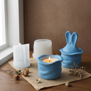 Easter bunny ear candle cup resin molds with silicone tools and finished blue containers