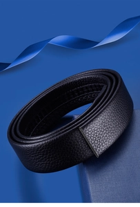 Close-up of black lychee grain leather belt with automatic track in a blue gift box