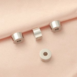 Set of four polished silver cylindrical spacer beads with large holes for DIY jewelry