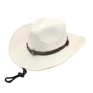 Detail of white straw cowboy hat featuring brown leather band and adjustable chin strap