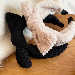 Thick plush bow headbands in black and cream beige soft faux shearling wool material