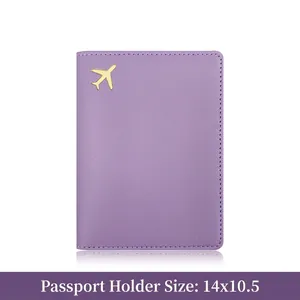 Taro purple leather passport holder with gold airplane logo in 14x10.5cm size