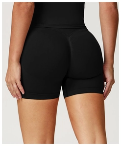 Rear view of seamless high-waisted black yoga shorts with scrunch butt lift detail