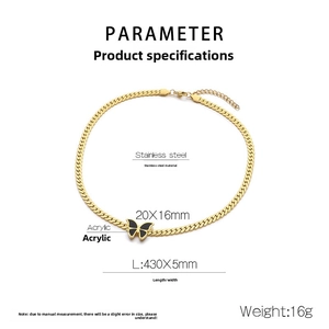 Detail of 18k gold plated snake chain necklace with black acrylic butterfly pendant