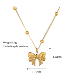 Detailed view of 3.1g bow pendant necklace with chain size and weight measurements