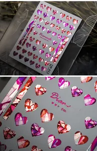 Detailed view of EM-012 3D heart diamond nail stickers with metallic reflective finish