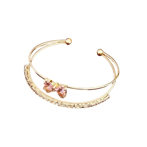 Elegant gold double-layer open bracelet with pink zircon bow and rectangular crystals