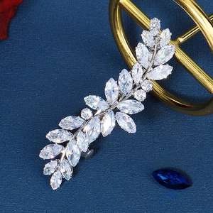 Macro shot of silver leaf hair clip with marquise and round cubic zirconia inverters