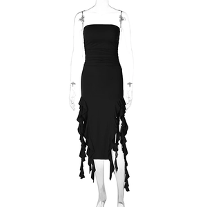 Detail of black strapless midi dress featuring lateral ruffles and pleated waist design