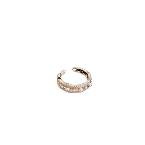 Elegant gold double-layered open ring with pearls and pavé zircon wave design