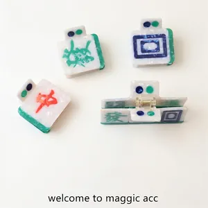 Unique mahjong shaped hair claw clips made of pearlescent acetate for elegant styling