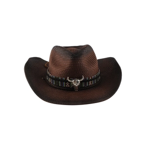 Detail of western straw hat with ethnic band and silver bull head metal ornament