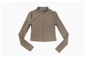 Detail of ribbed texture and stand collar on slim-fit brown yoga zip-up jacket