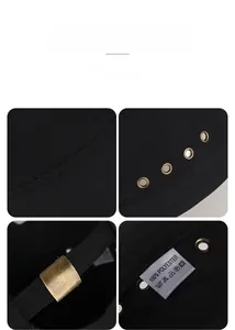 Détails de la casquette noire avec œillets métalliques, boucle bronze et étiquette polyester