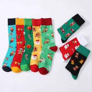 Set of 8 colorful Christmas themed cotton socks featuring Santa Claus and reindeer patterns