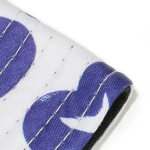 Close-up of heart print pattern and high-quality stitching on white sun hat fabric