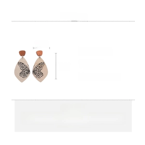 Detail view of wood butterfly earrings showing 7.5cm dimensions and 4.1g weight